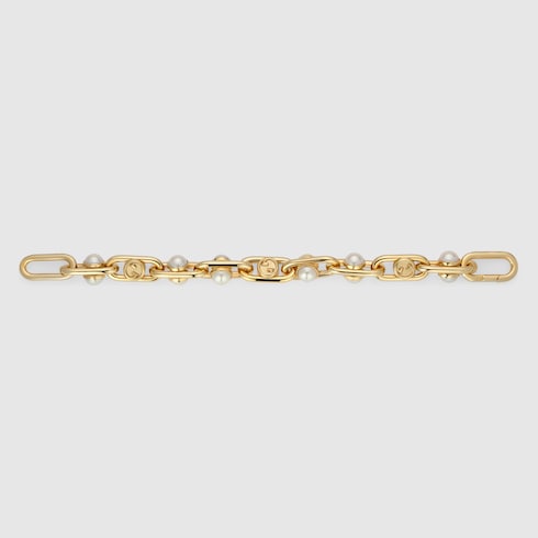 Bracelet with mobile pearls - gold-toned brass