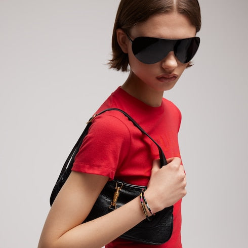 Leather double bracelet with Gucci script - black leather