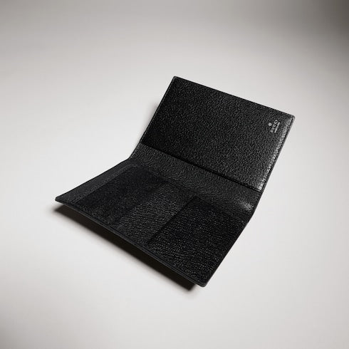 Gucci Essence Classic passport case - black GG canvas