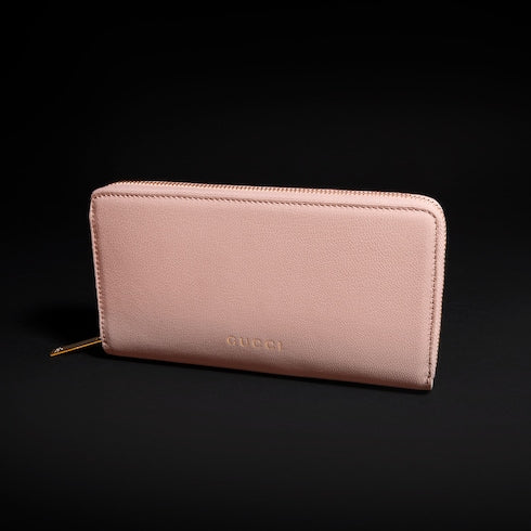 Zip around wallet with Gucci lettering - light pink leather