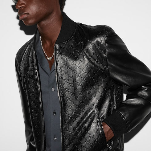 Embossed GG leather bomber jacket - black