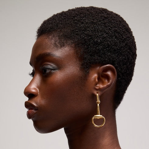 Horsebit earrings - gold-toned brass