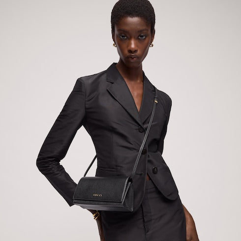Mini pouch with Gucci lettering - black leather