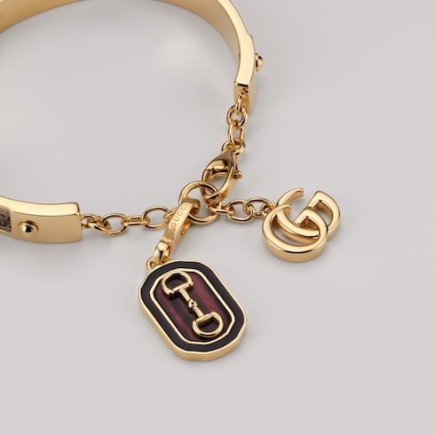 Horsebit motif charm - gold-toned brass