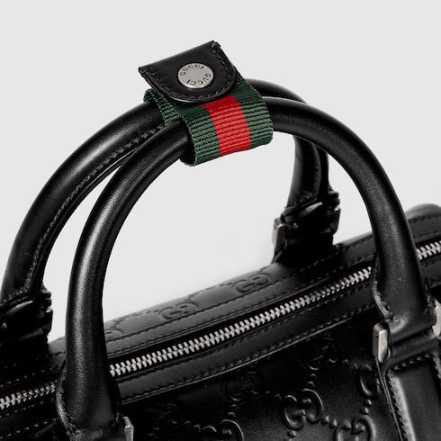 GG Emblem small duffle bag - black GG leather