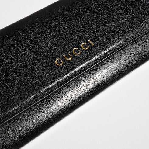 Wallet with strap and Gucci lettering - black leather