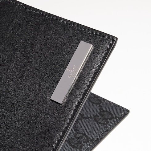 Bi-fold wallet with metal tag - black leather