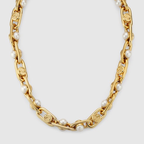 Necklace with mobile pearls - gold-toned brass