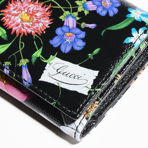 Flora-motif bi-fold card case - black and multicolor canvas