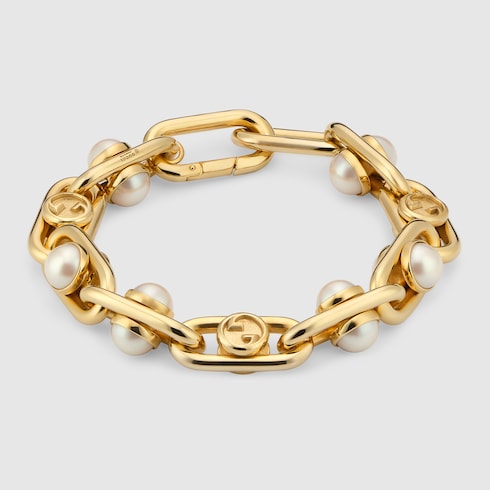 Bracelet with mobile pearls - gold-toned brass