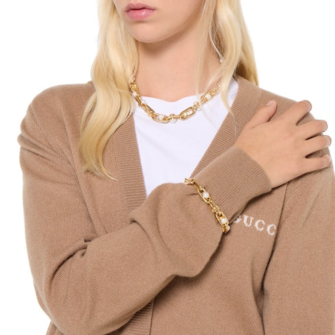 Bracelet with mobile pearls - gold-toned brass