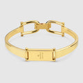 Stirrup motif bangle bracelet - gold-toned brass