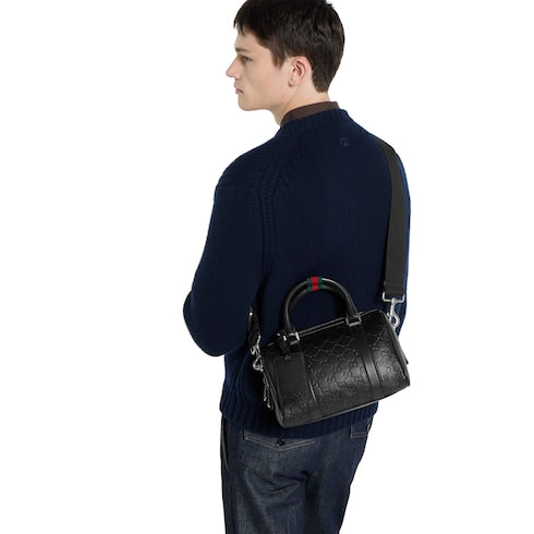 GG Emblem small duffle bag - black GG leather